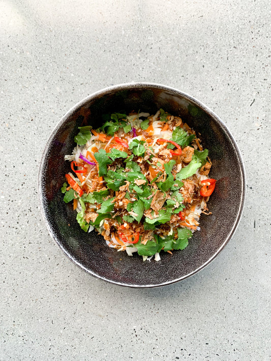 rice noodle bowls with fresh coriander and chilli