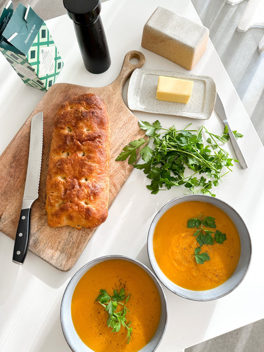 Pumpkin soup with fresh focaccia and butter