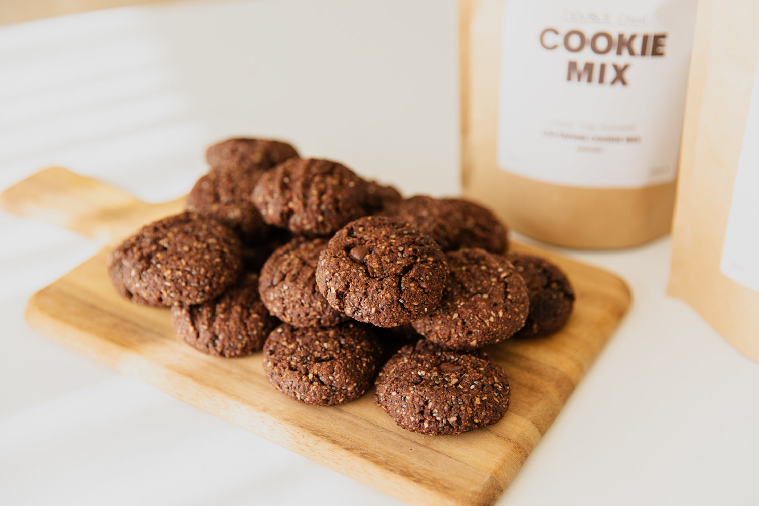 Teagan's Double Choc Chip Cookie Mix freshly made cookies on wooden board