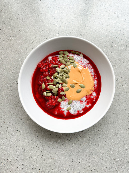 chia pudding with berrys, peanut butter and pumpkin seeds